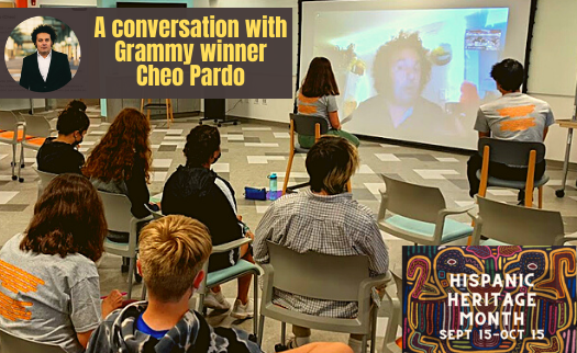 students talk with Cheo Pardo