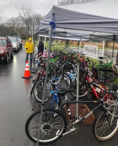 Cars lined up for donations, dozens of bikes collected underneath tent