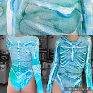 artwork bodies in blue bodysuite