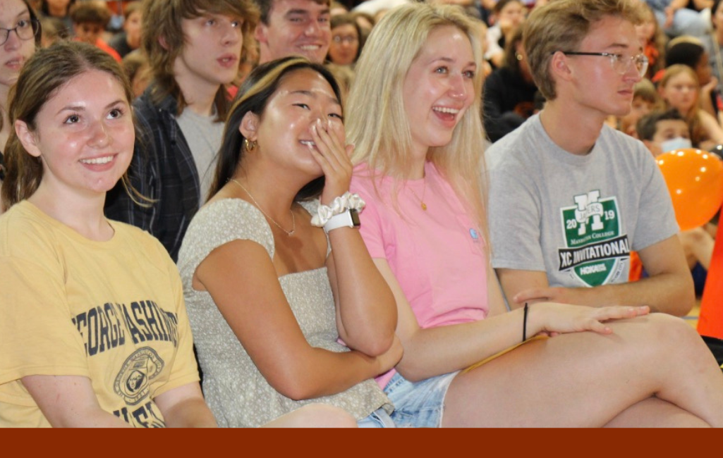 students looking up and laughing