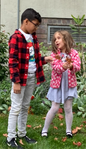 Two students outside of Elsmere Elementary School