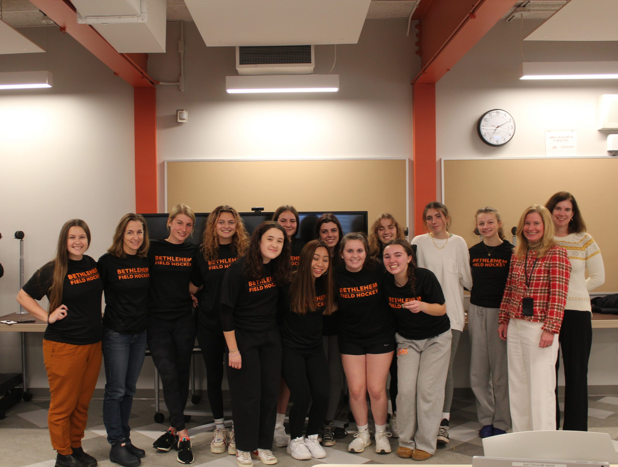 Field Hockey Team poses with Athletic Director, Len Kies, Superintendent Jody Monroe, and Board of Education President Holly Dellenbough