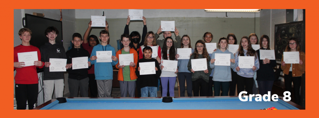 group of eighth graders holding certificates
