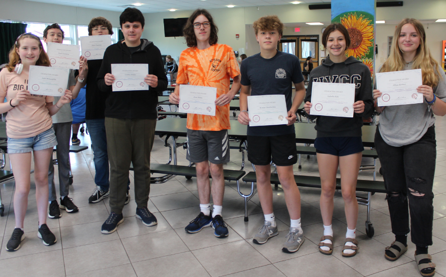 group photo of students holding certificates