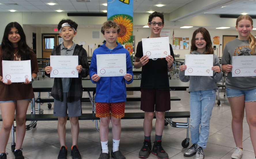 group photo of students holding certificates