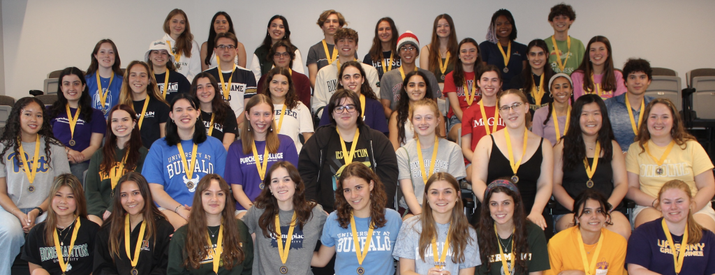 large group of students pose for photo