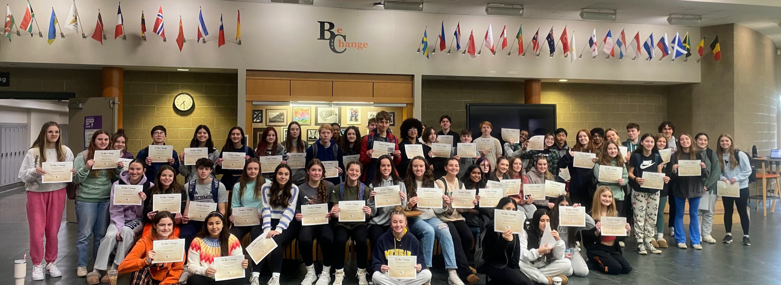 Group photo of the September and October "Be the Change" recipients