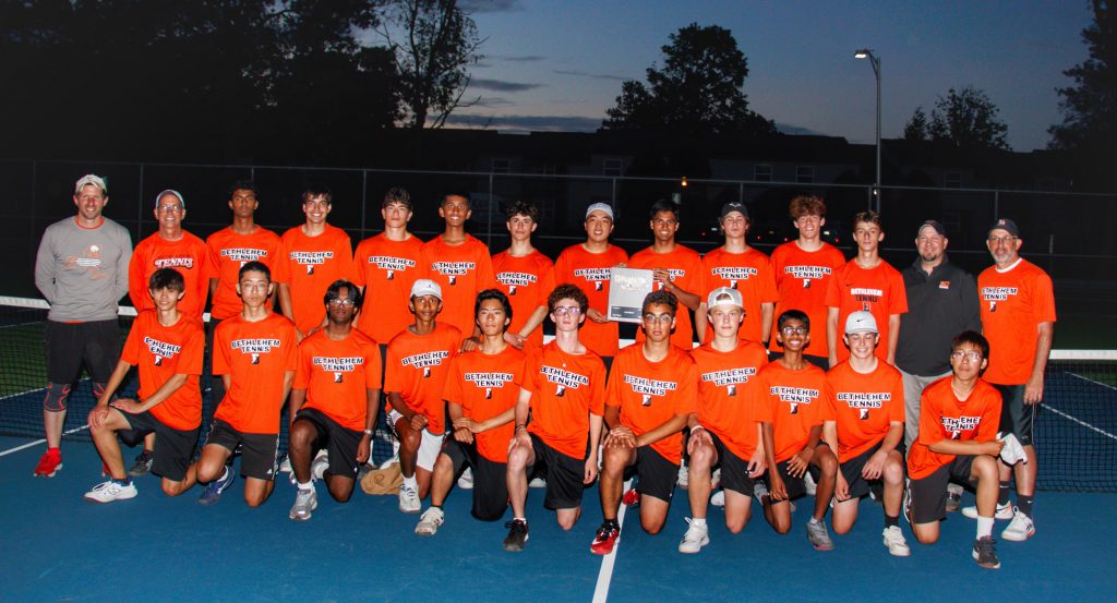 tennis team poses for photo
