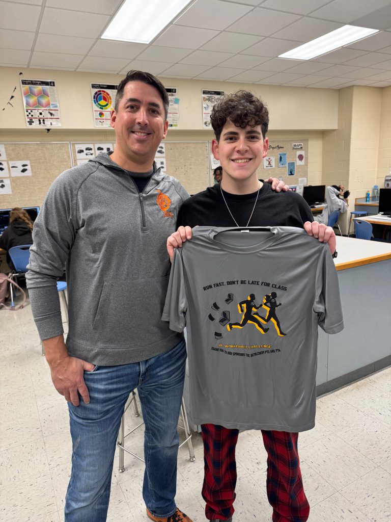 student and teacher with tshirt
