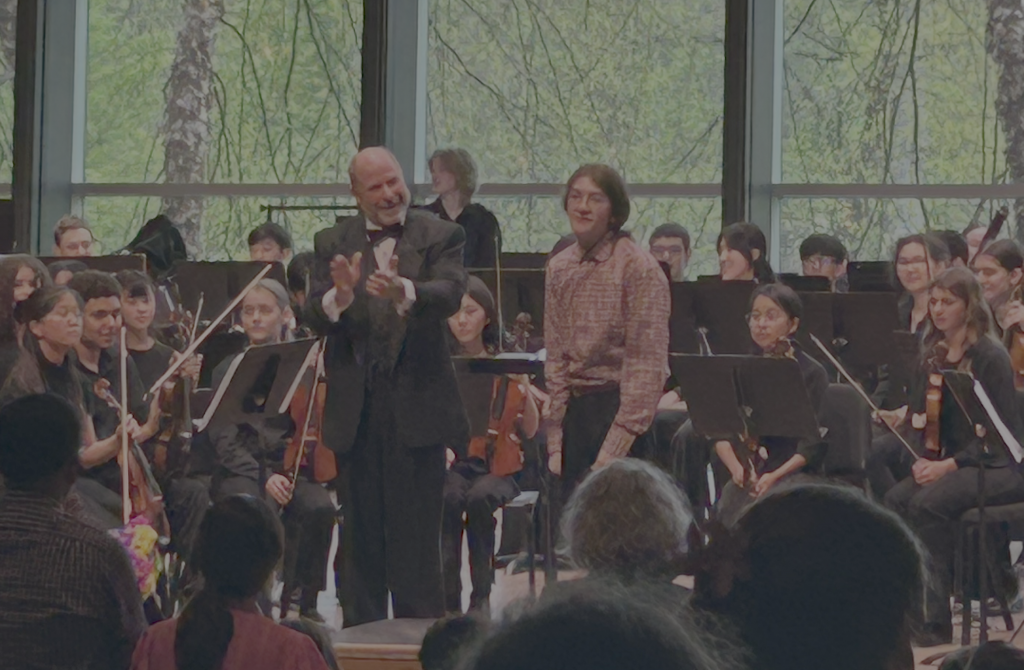 people clapping for performer