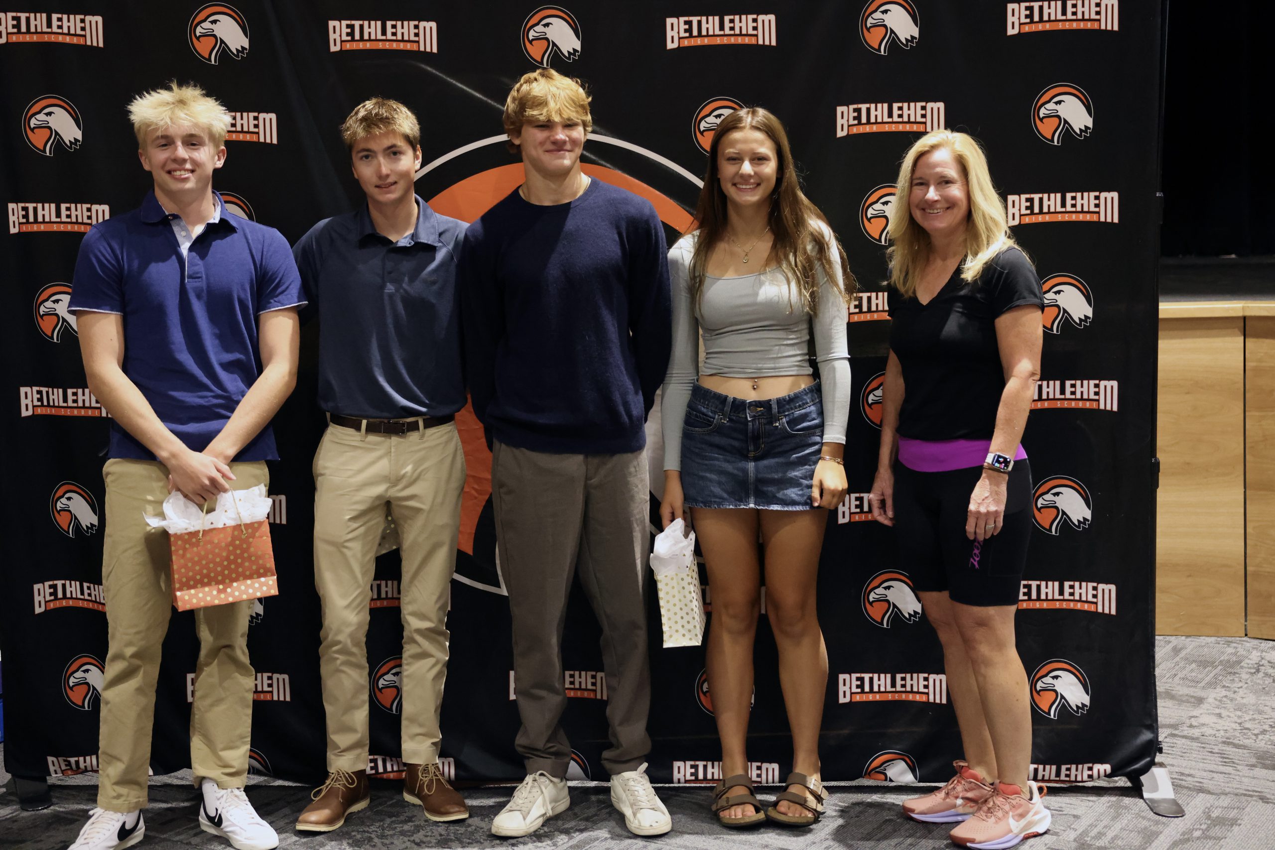Grace Bosworth, Aidan Geis, Lucas Peters, and Mikolaj Wloszczynski pictured with Superintendent Monroe