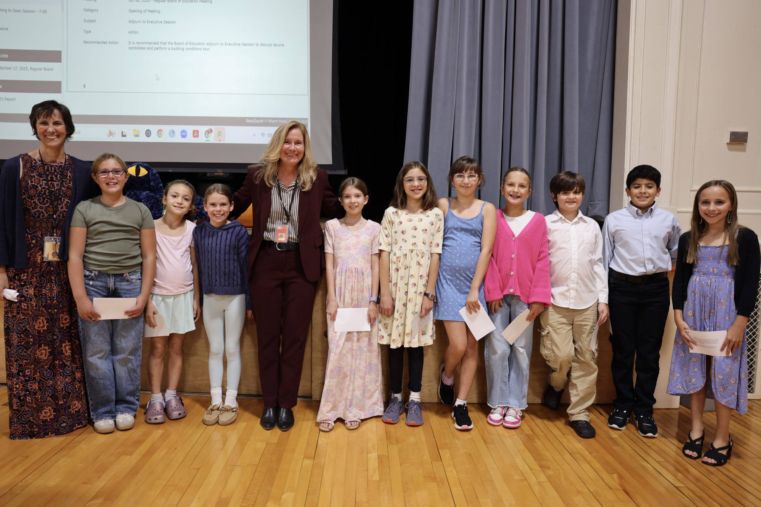 group of students poses for photo