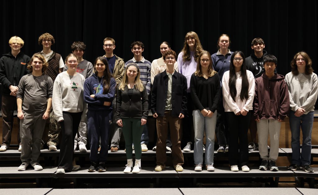 group of students poses for photo