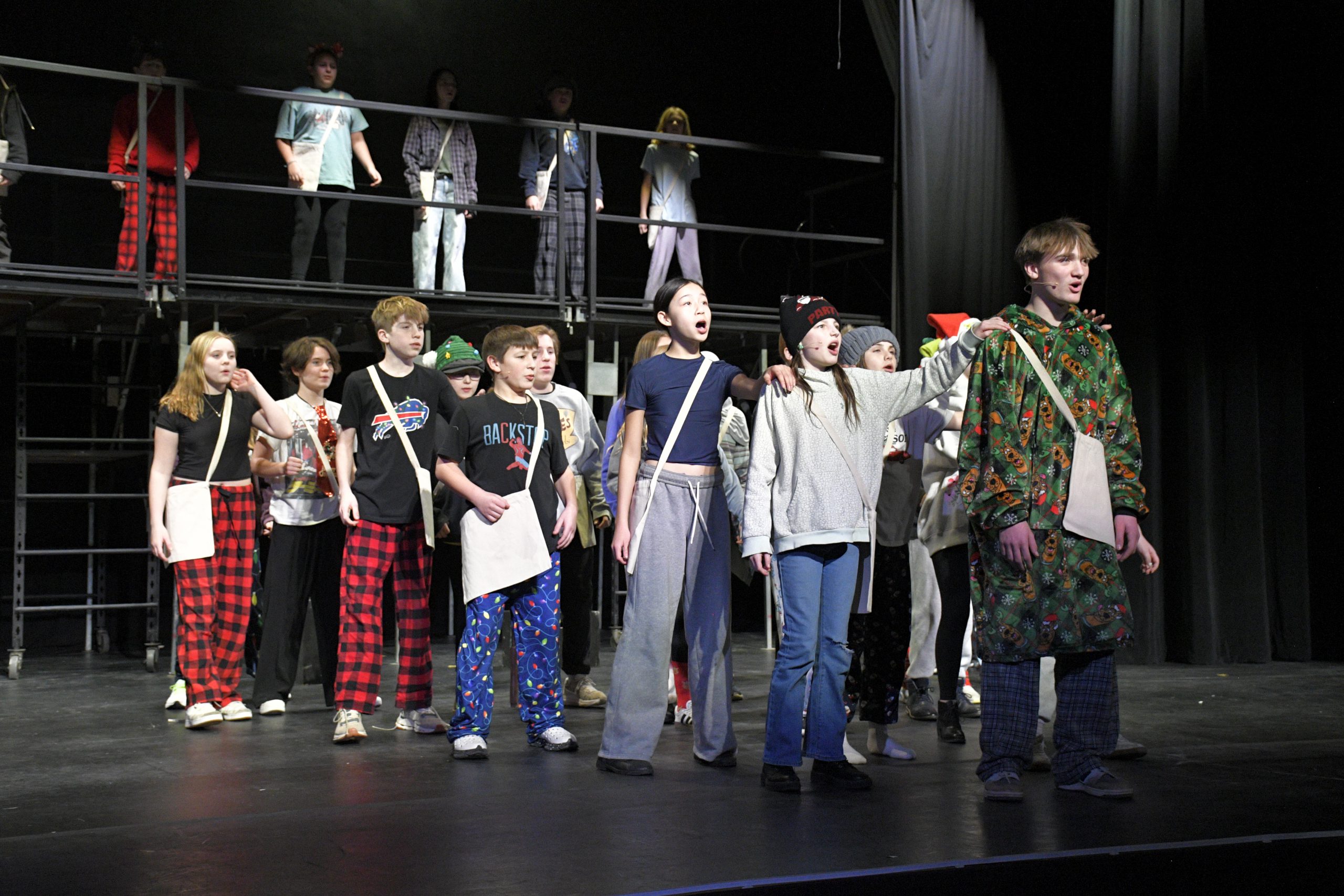 students perform onstage