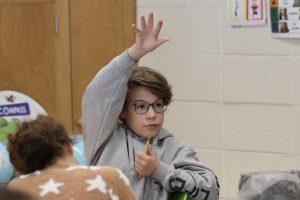 Image of fifth-grade student during presentation
