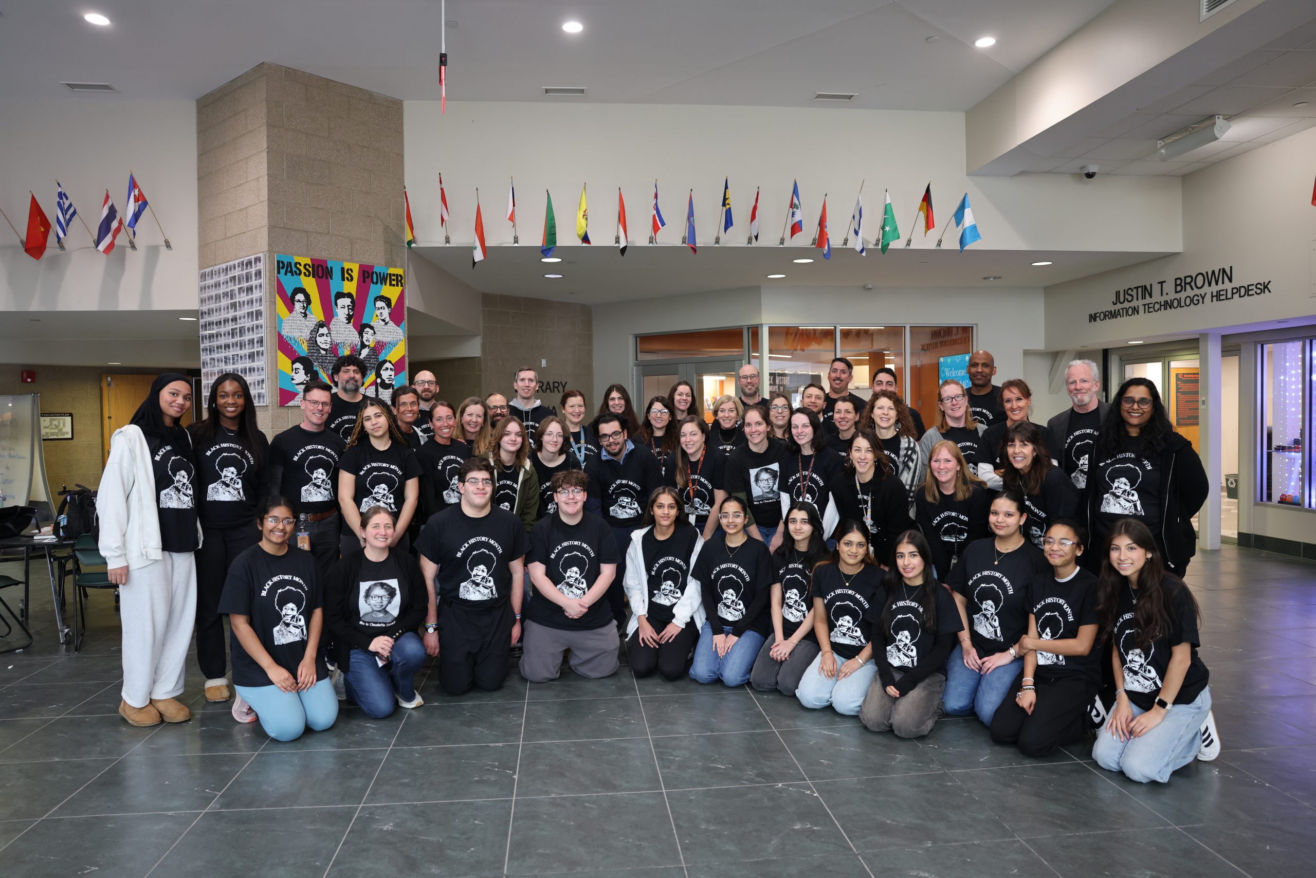 Image of students and staff wearing the 2026 BHM t-shirts