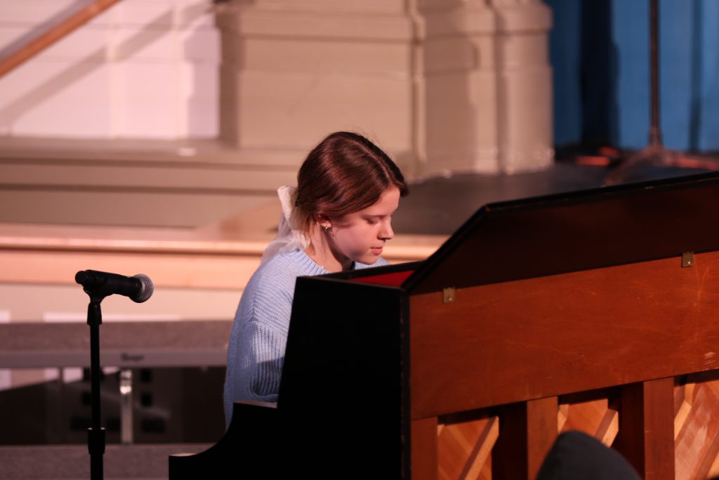 student playing piano