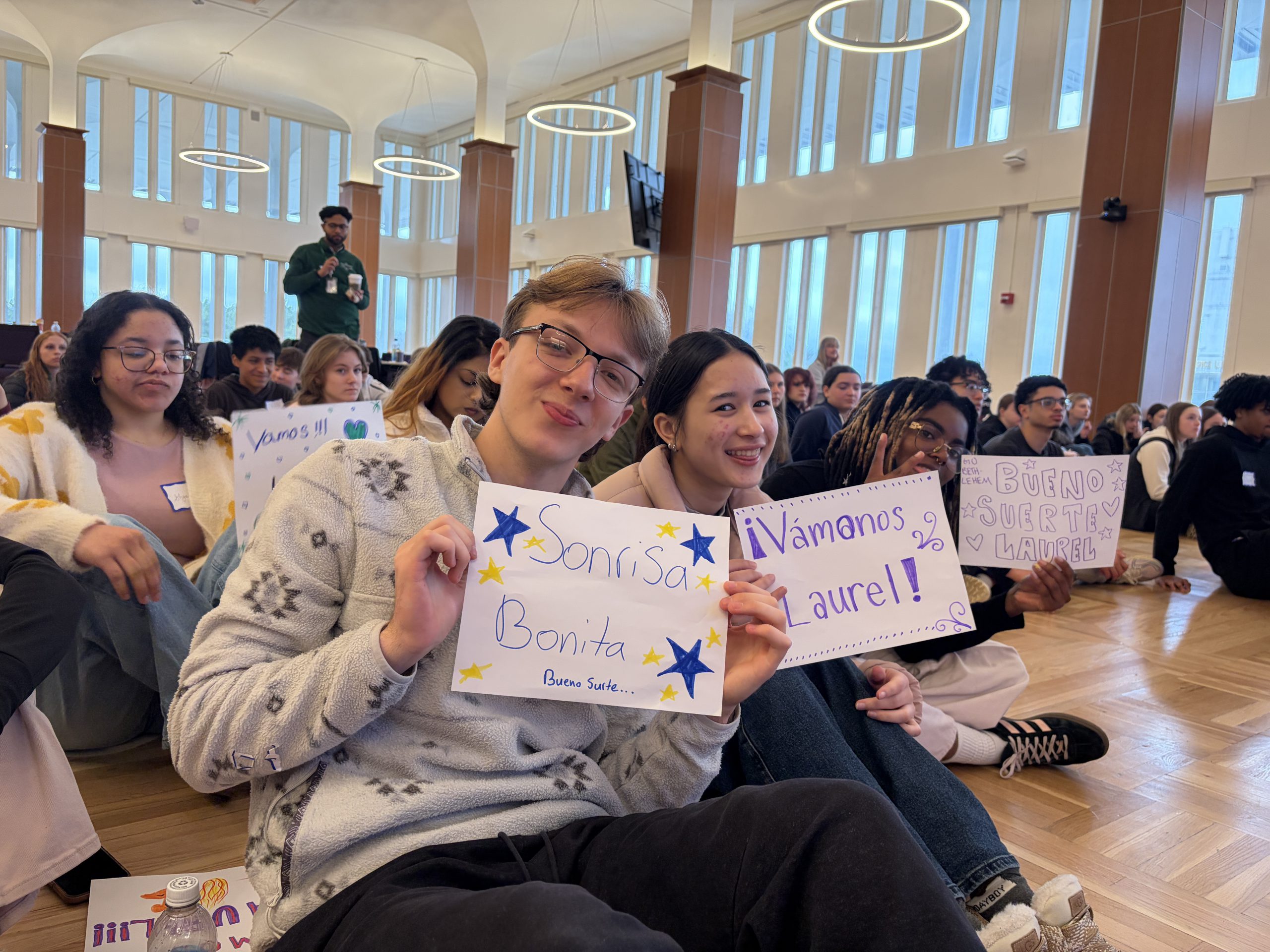 students holding signs