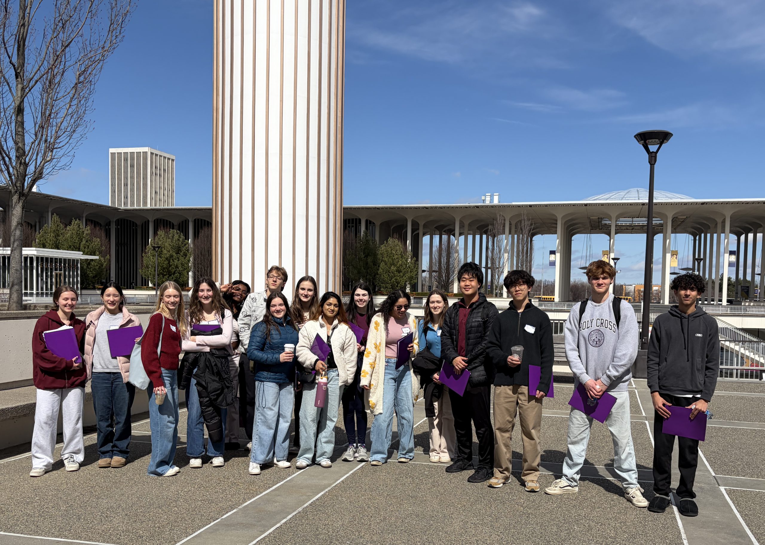 students pose for group photo outside UAlbany