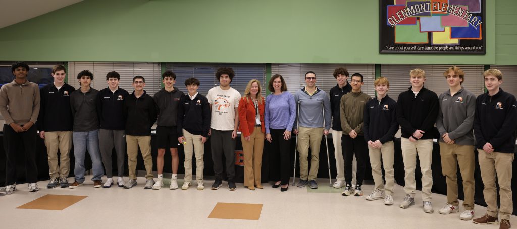 team posing for photo