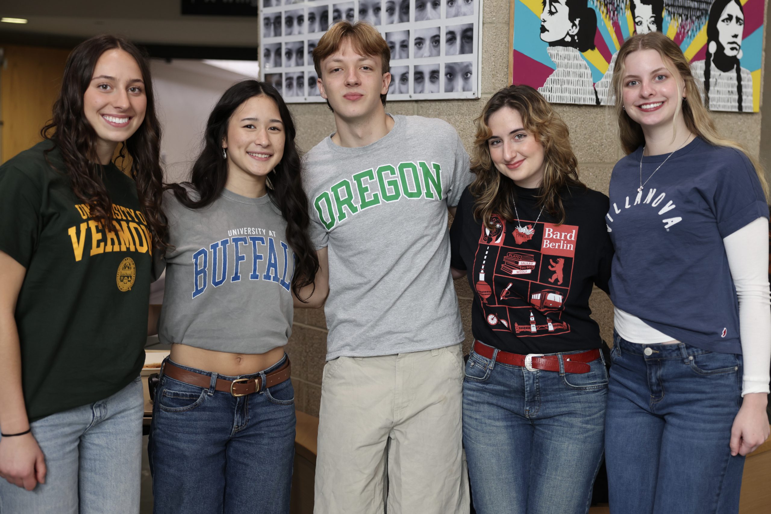 group of students wearing college tshirts