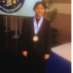 student wearing medal