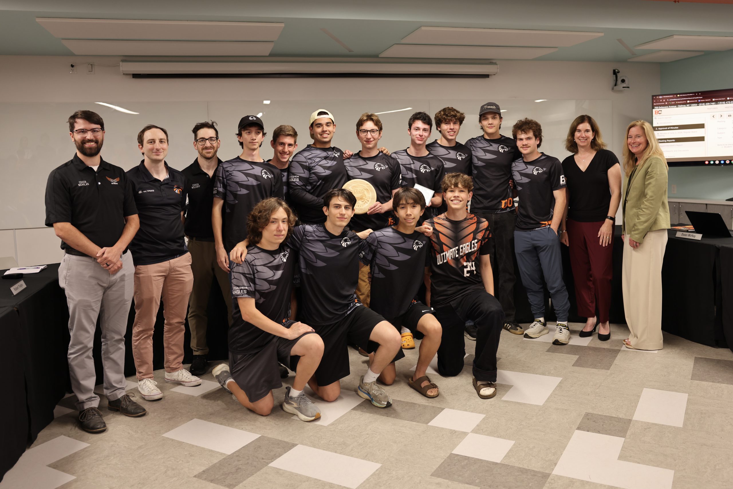 Image of Boys Ultimate Frisbee team with BOE President Holly Dellenbaugh and Superintendent Jody Monroe