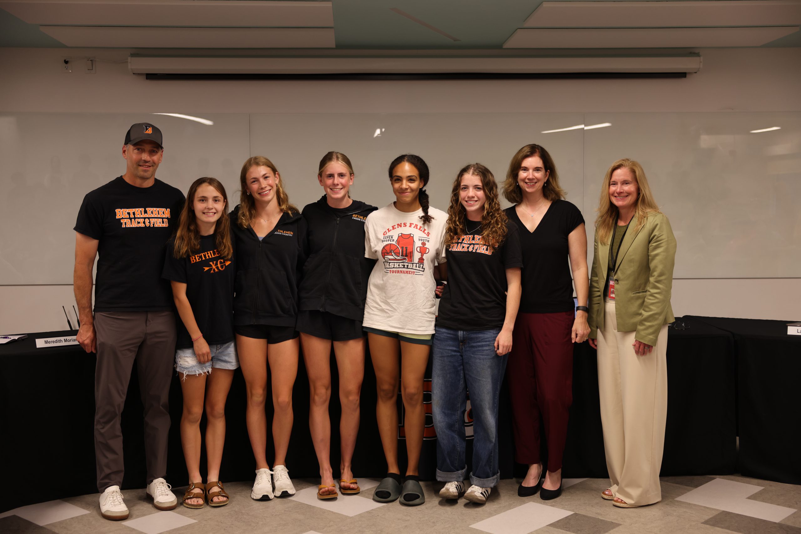 Image of Girls Track & Field team with BOE President Holly Dellenbaugh and Superintendent Jody Monroe