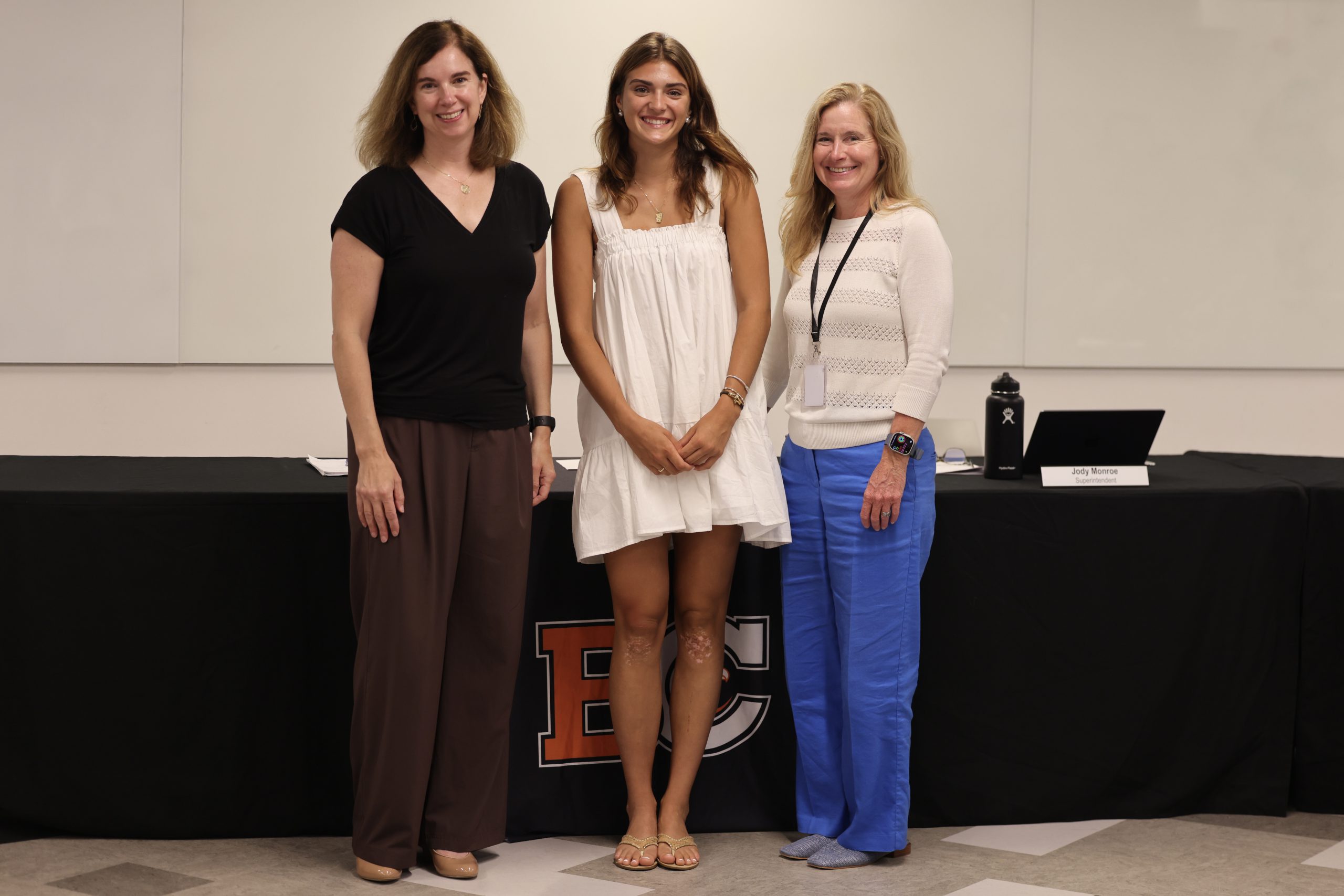 Image of Brianna Fabian with Board of Education President Holly Dellenbaugh and Superintendent Jody Monroe
