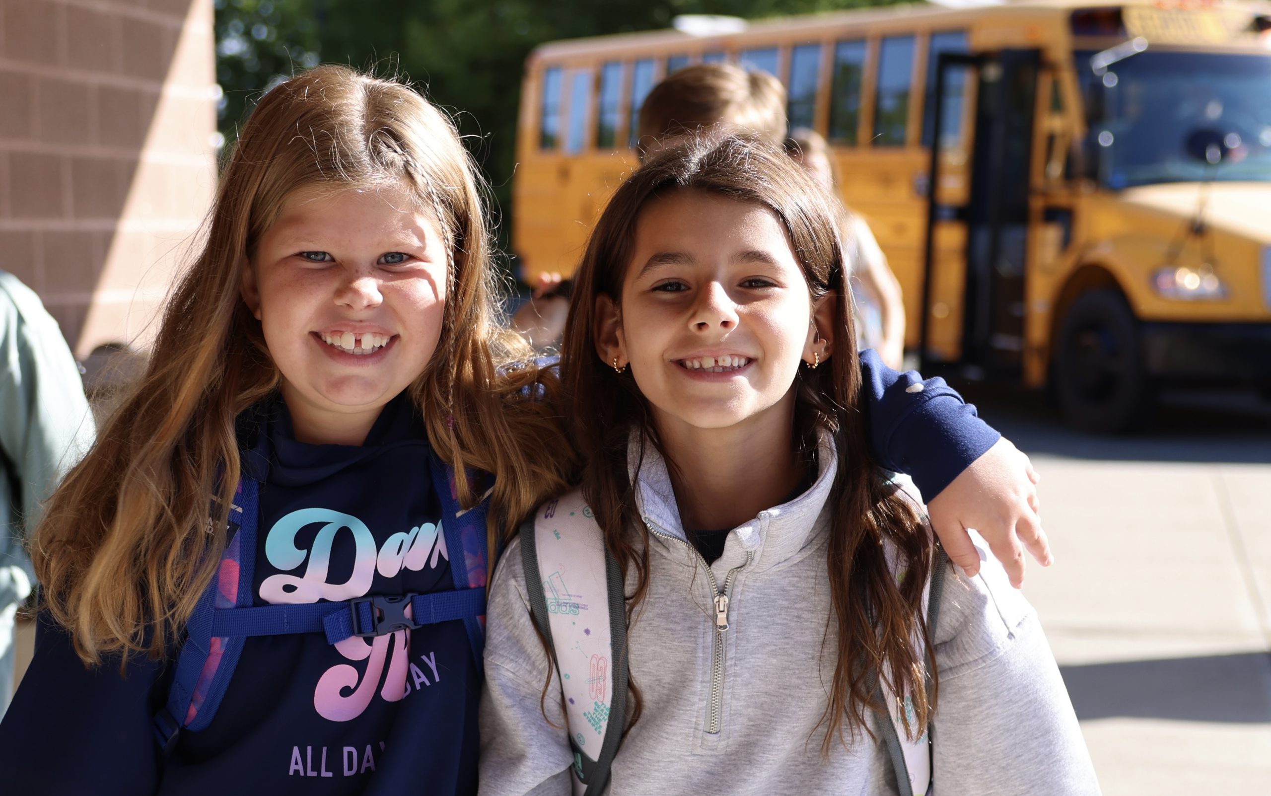 two students smiling