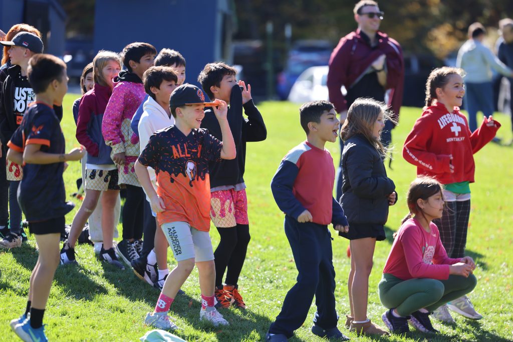 students cheer for classmates